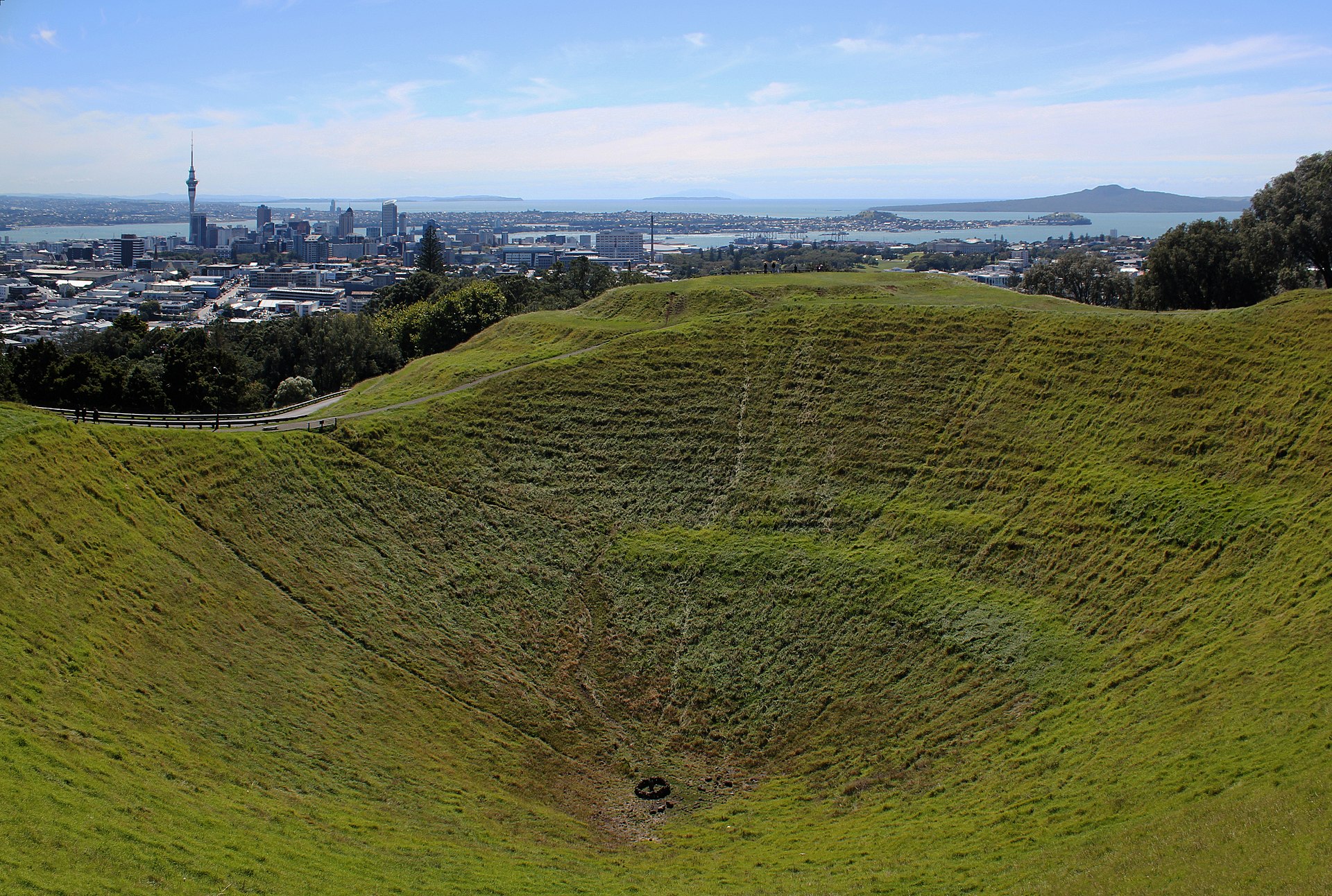 Mount Eden crater with Auckland skyline and Rangitoto
