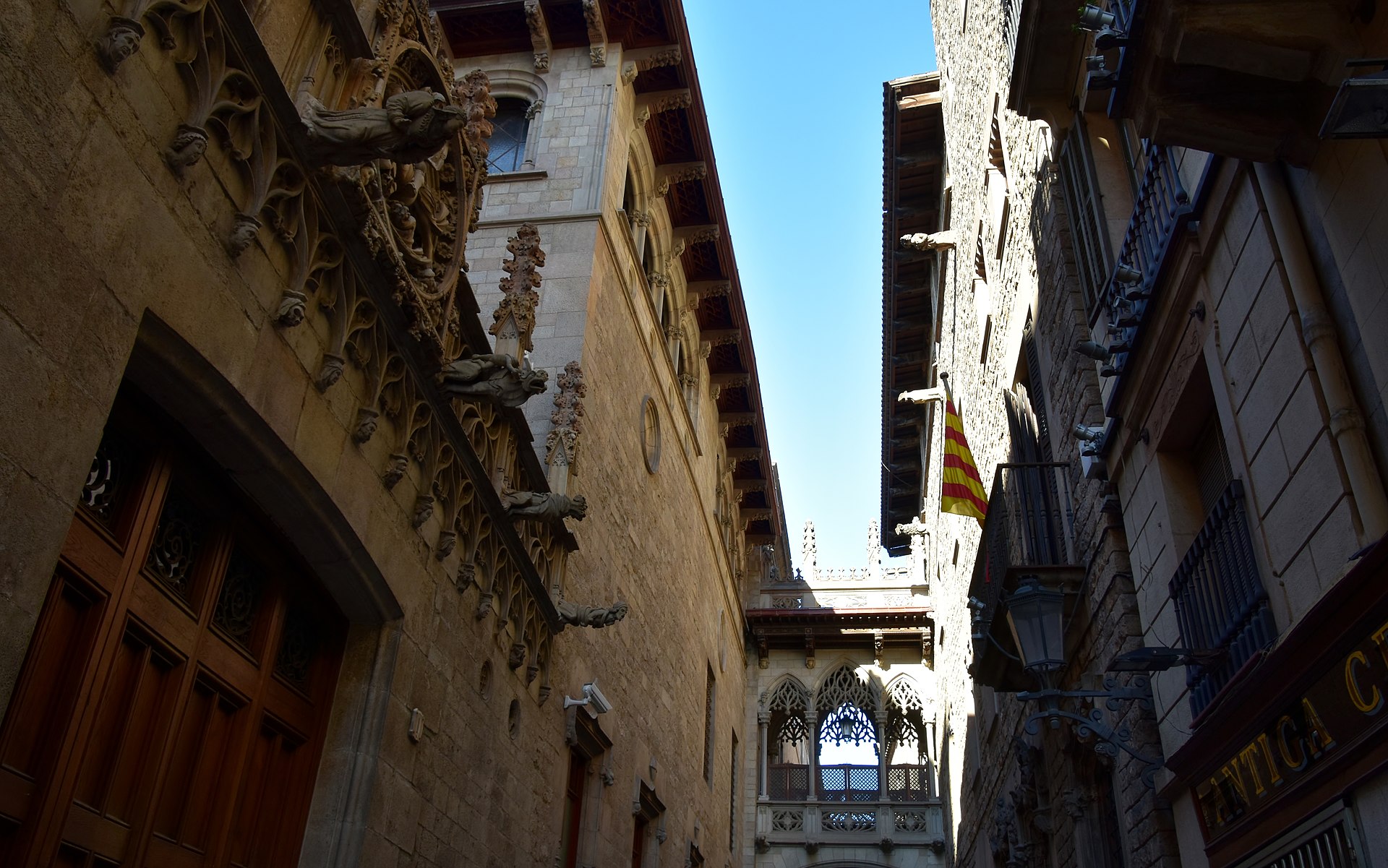 Narrow stone street and Gothic facades in Barcelona's old city