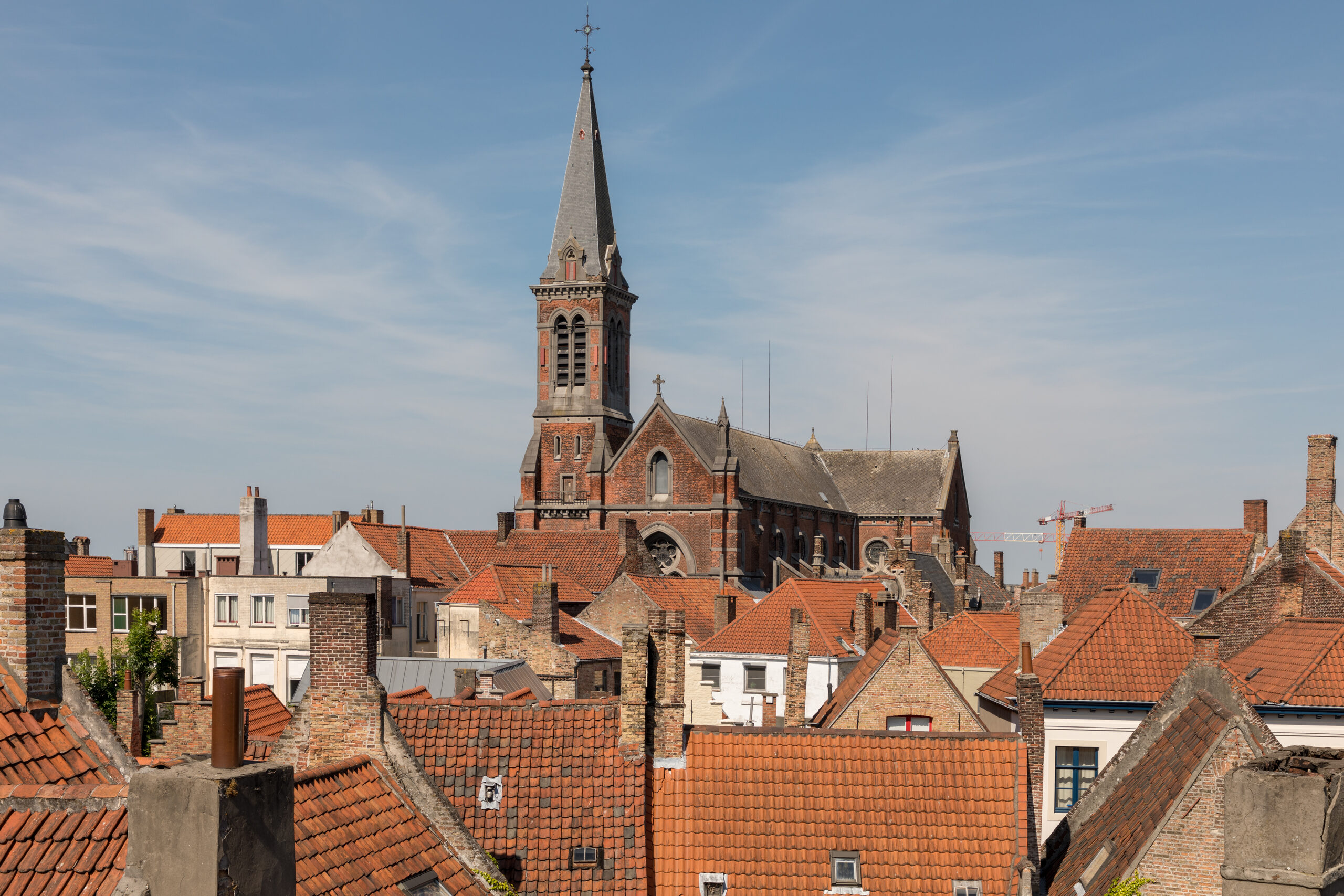 Bruges rooftops and church tower from an elevated viewpoint