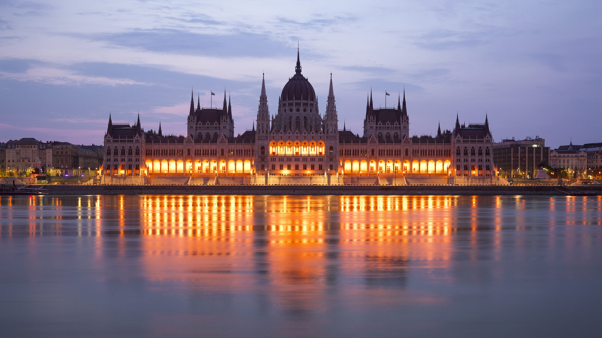 Hungarian Parliament Building across the Danube in Budapest at dusk