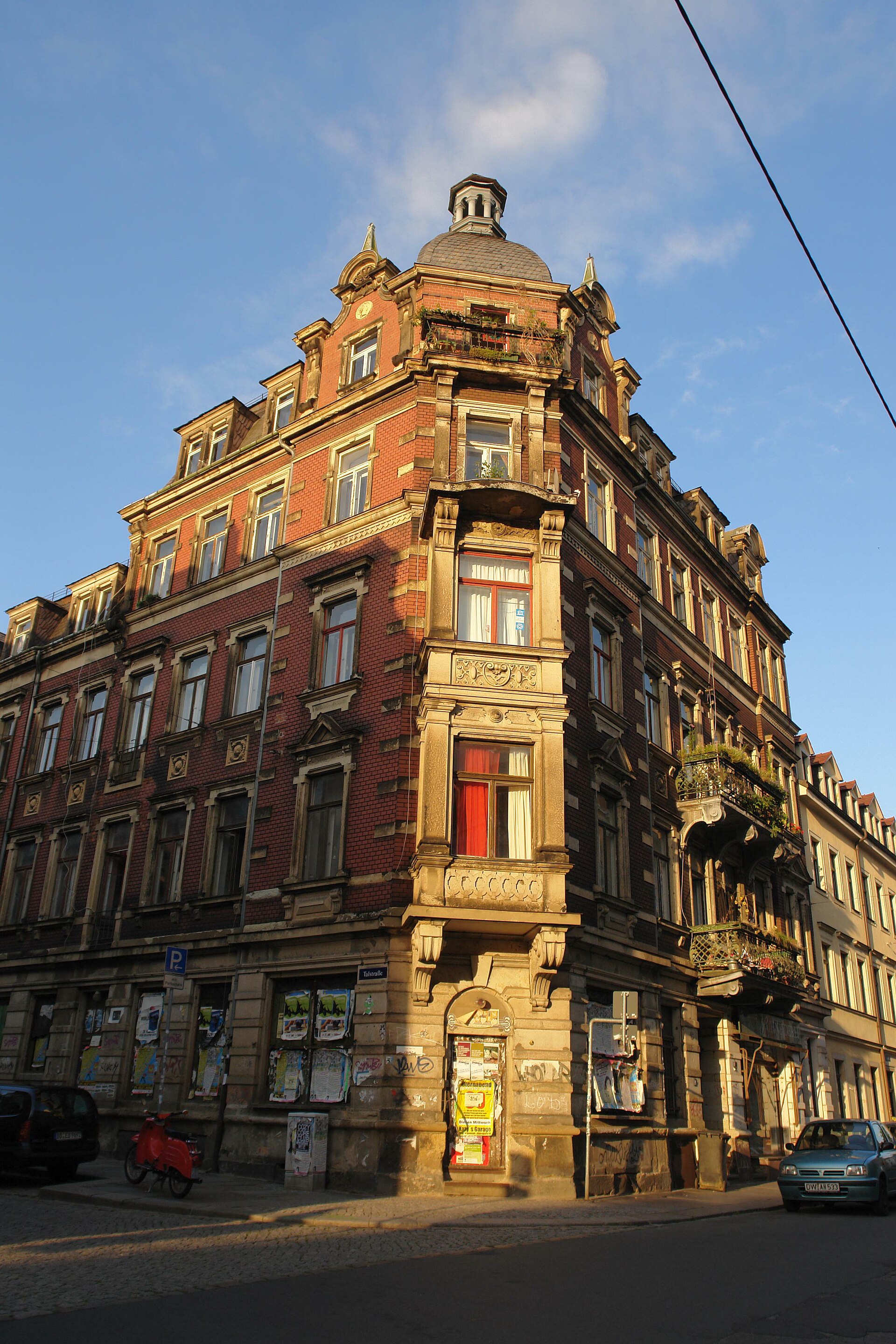 Historic apartment building on Talstrasse in Dresden's Neustadt district at golden hour