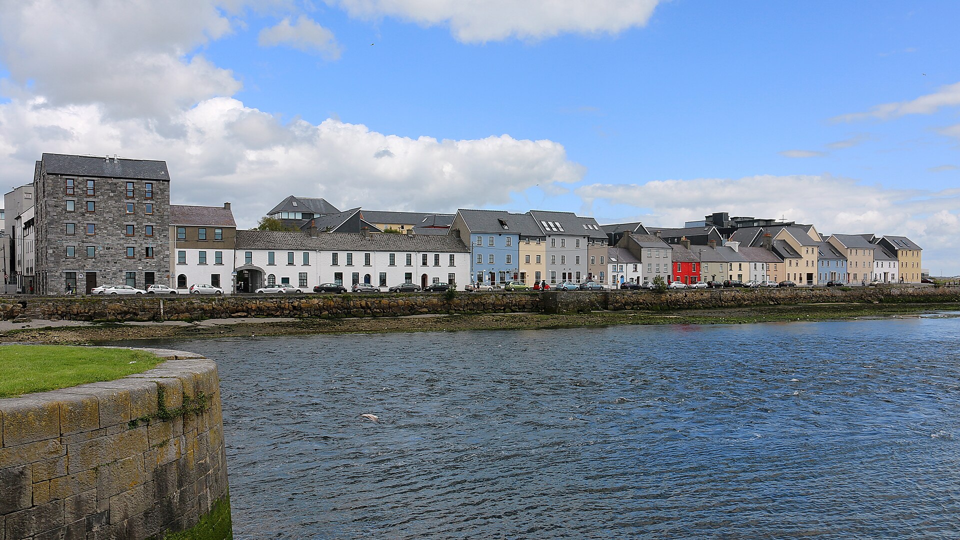 The Long Walk along the River Corrib in Galway with colorful waterfront houses