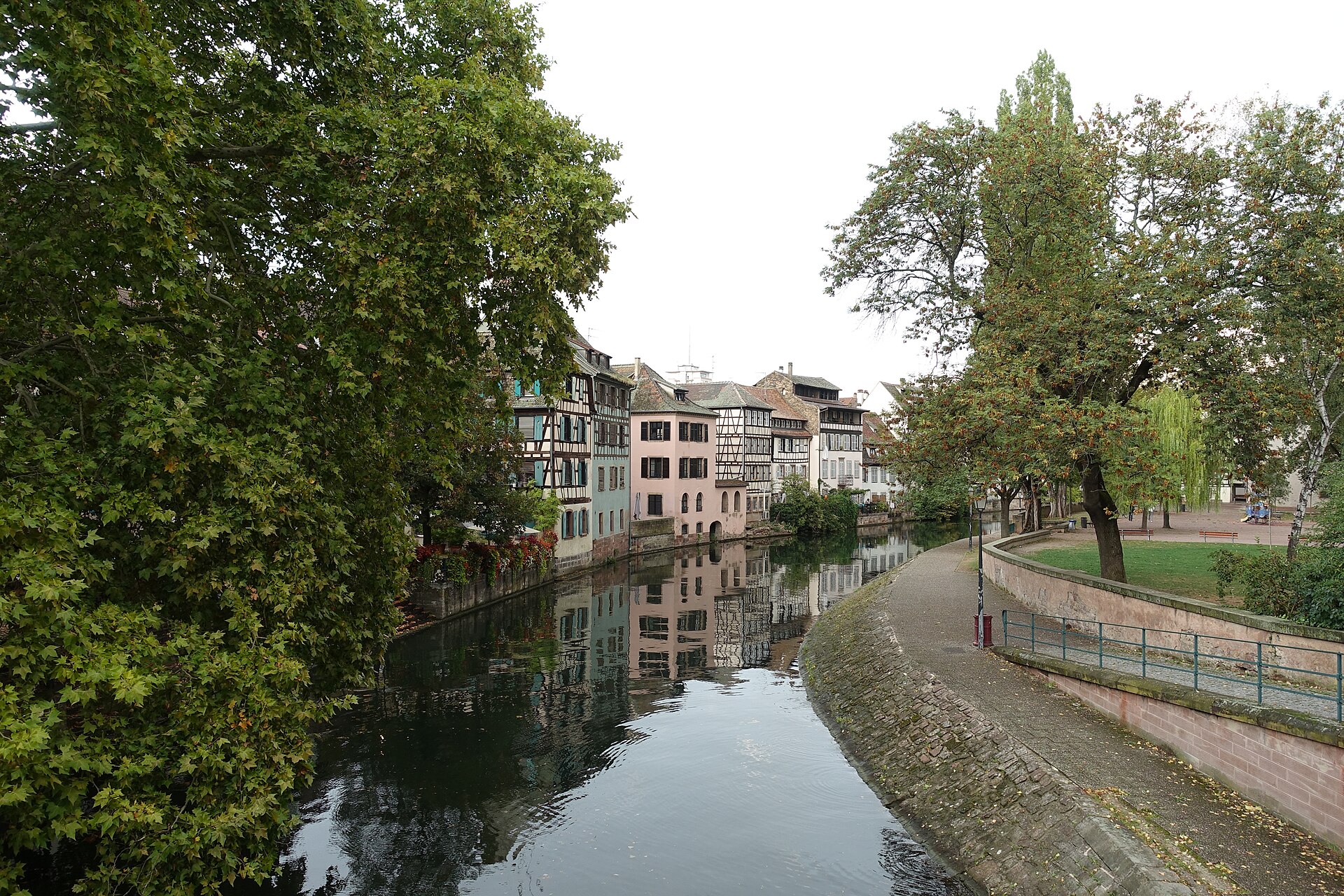 Canal view through Petite France in Strasbourg with half-timbered houses along the water