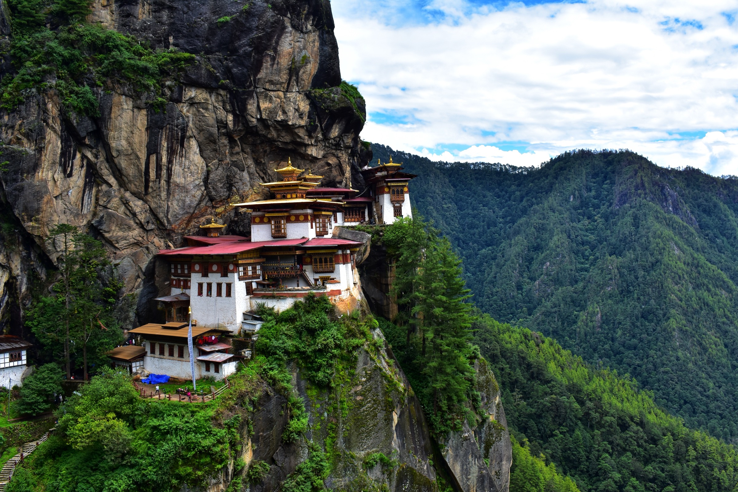 Paro Taktsang monastery set into the cliffside above the Paro valley in Bhutan
