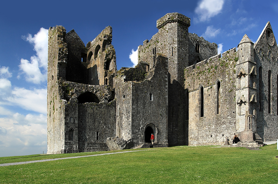 The Rock of Cashel rising above the grass in County Tipperary, Ireland