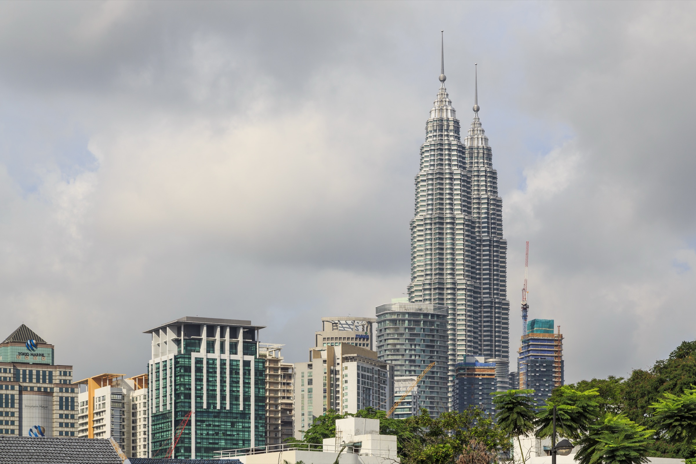 Petronas Towers rising above Kuala Lumpur in Malaysia