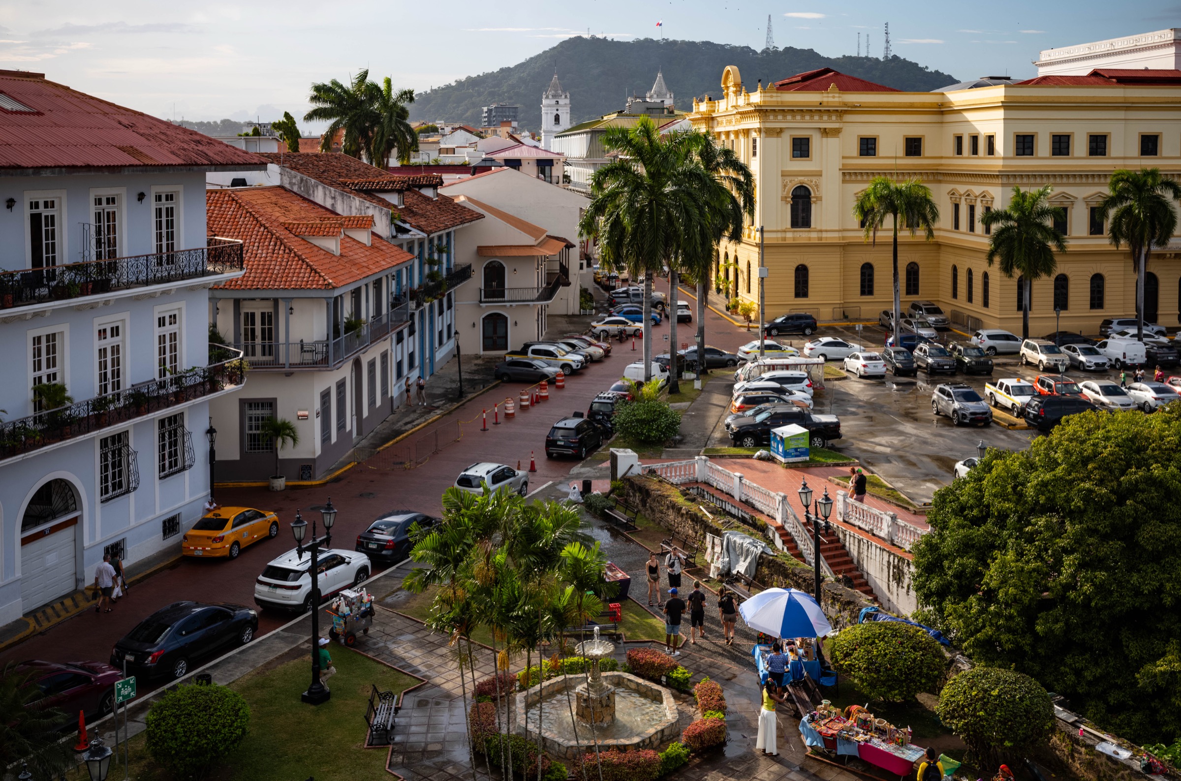 Casco Viejo rooftops and civic buildings in Panama City with Ancon Hill behind