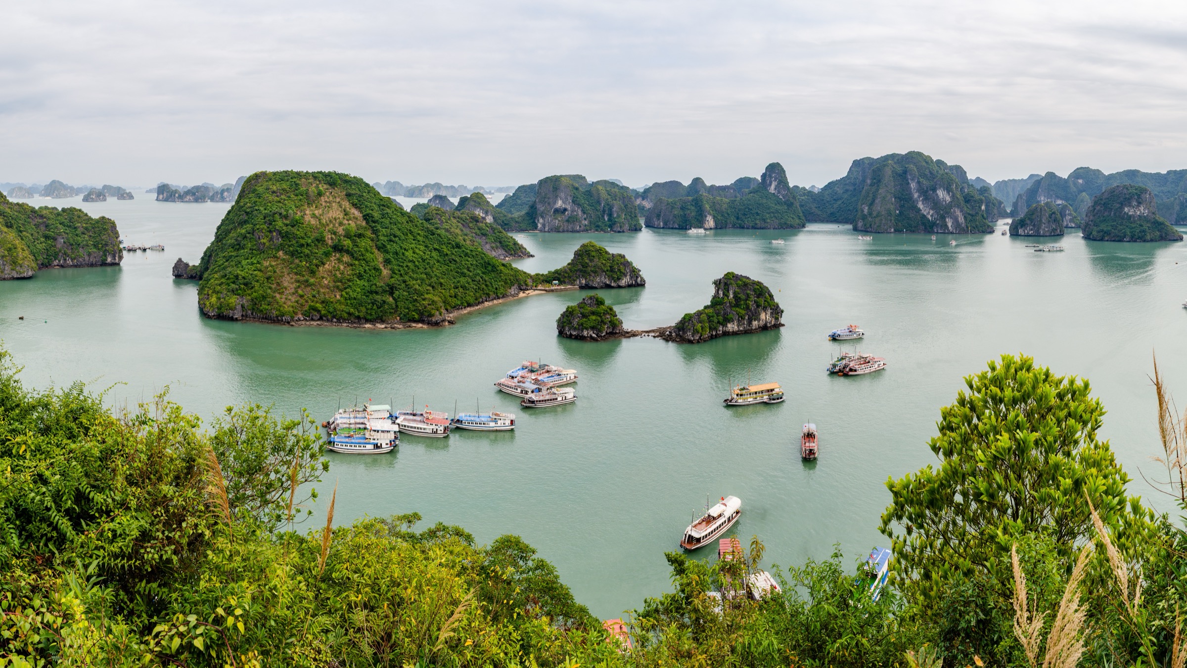 Panoramic view over the limestone islands of Ha Long Bay from Ti Top Island in Vietnam