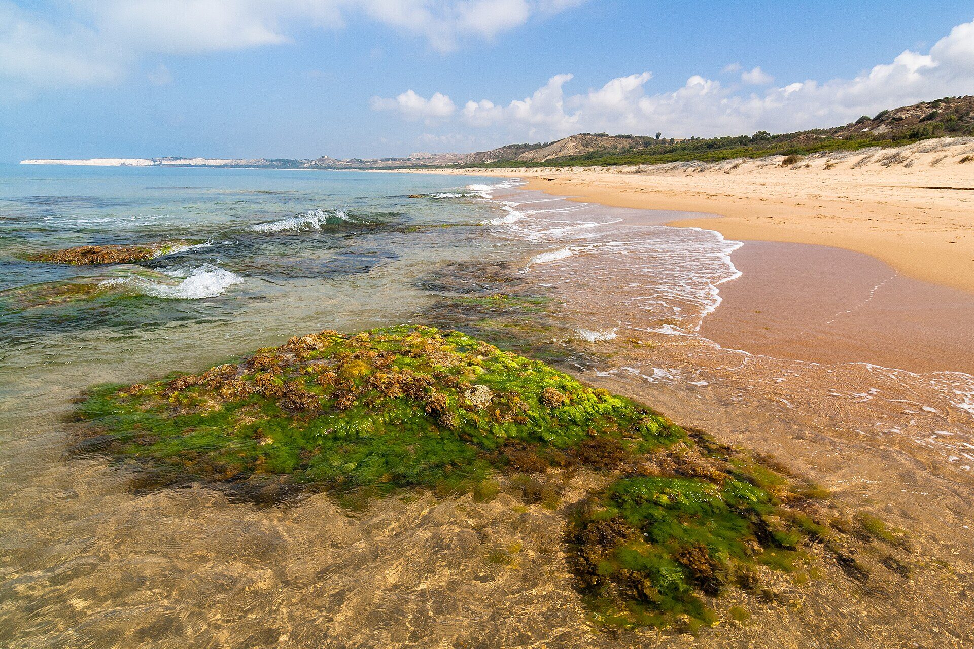 Unbuilt sandy shoreline at Torre Salsa Nature Reserve in Sicily