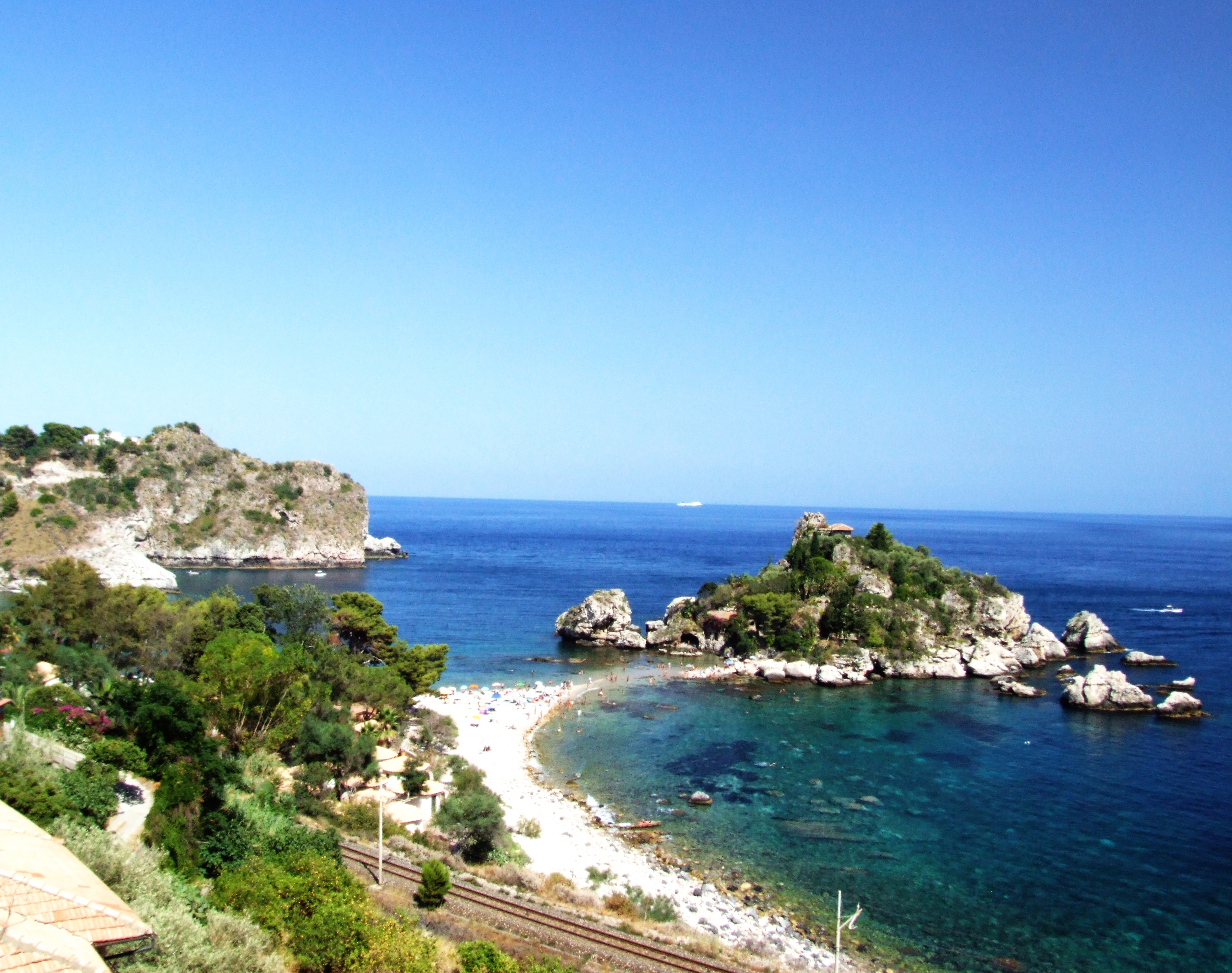 Isola Bella off Taormina in Sicily with clear June water