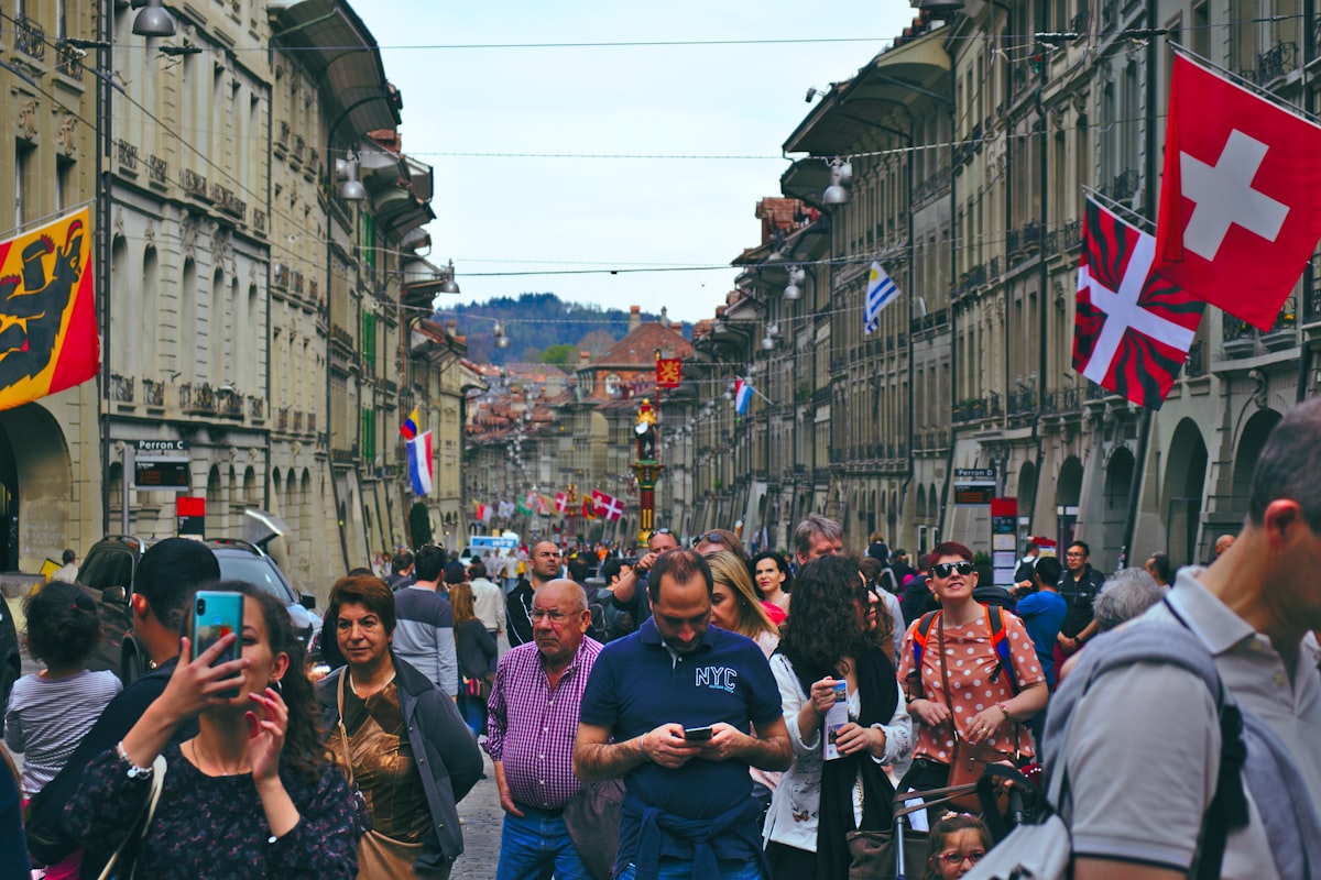 Crowded historic street during peak tourist season