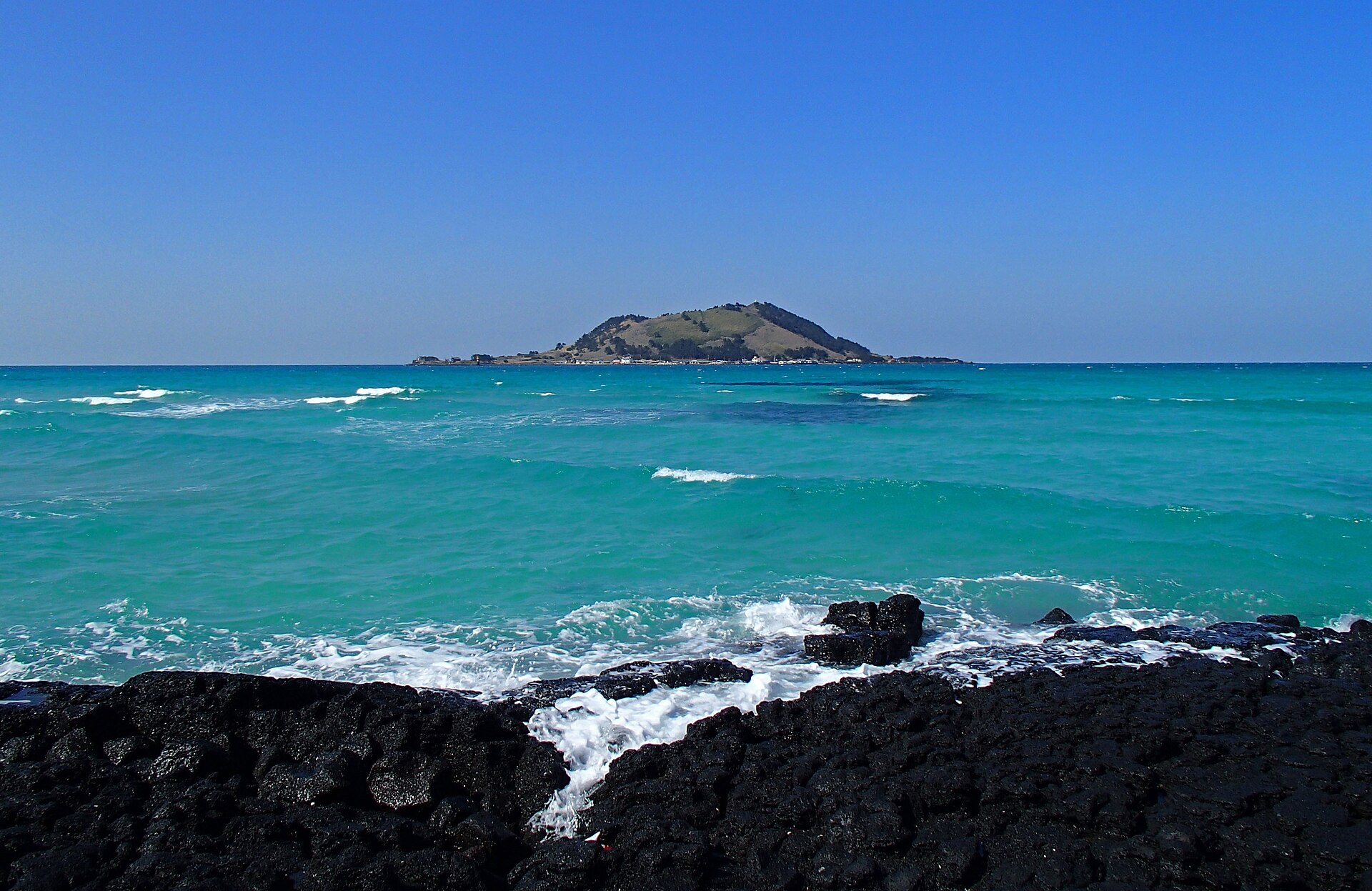Jeju volcanic coastline and clear water