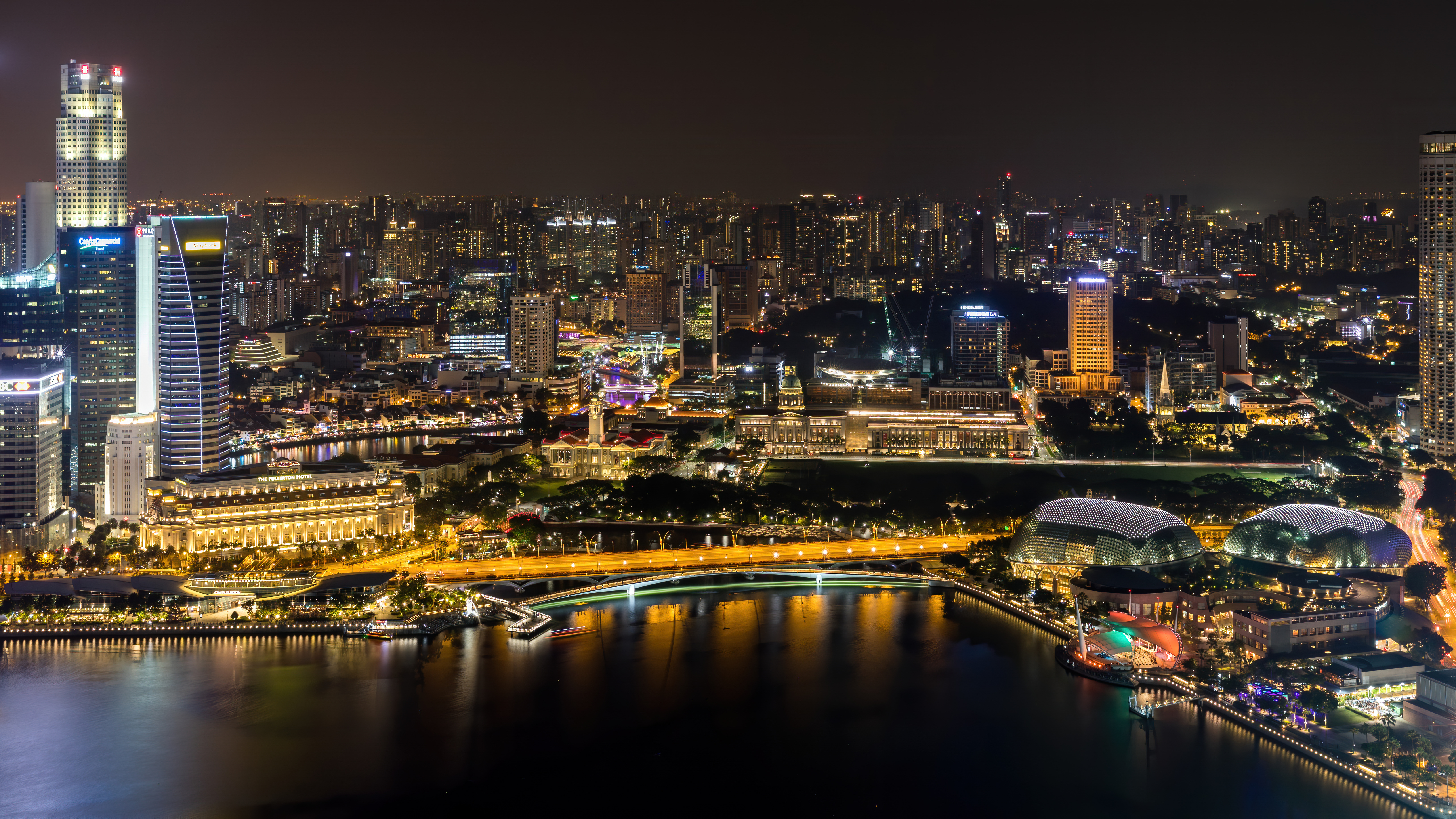 Singapore skyline at night over Marina Bay and the Civic District