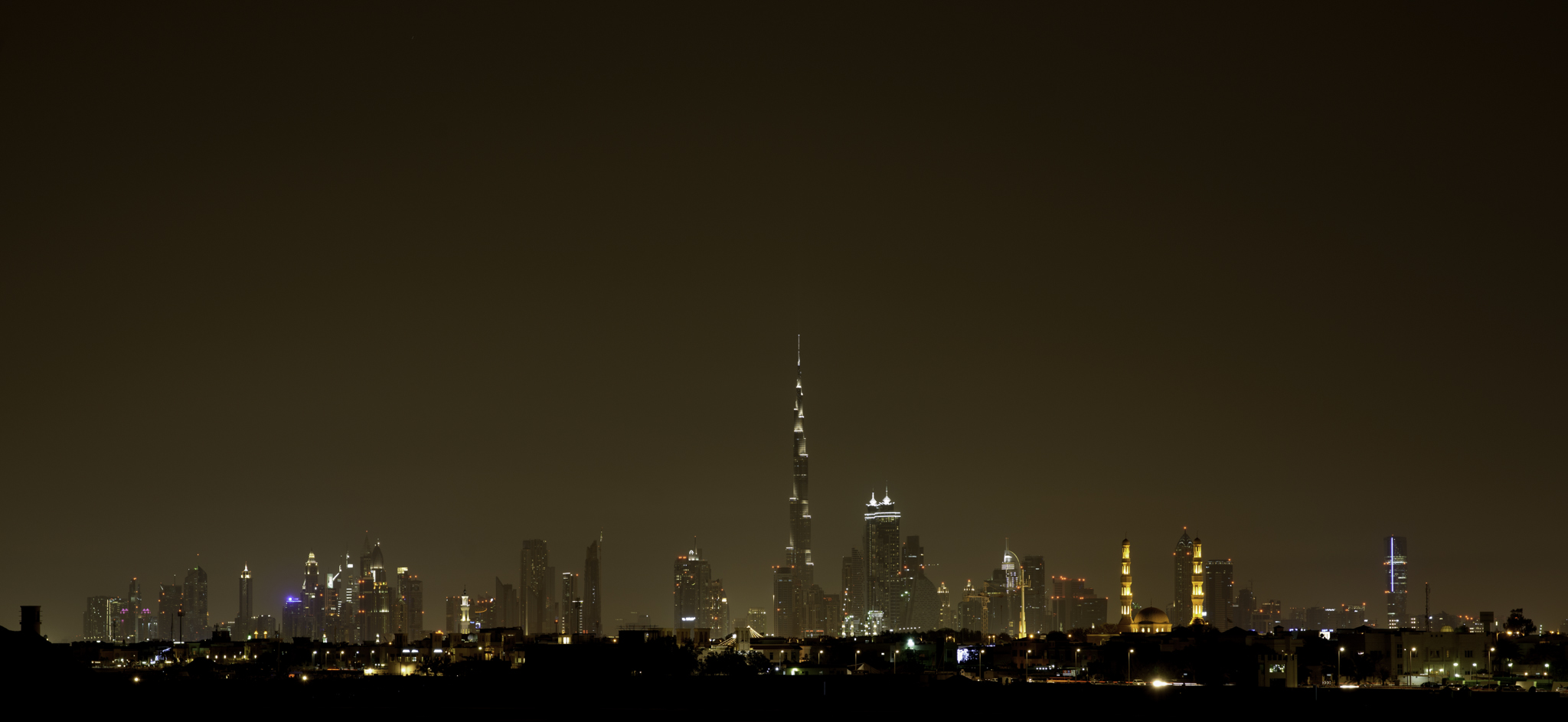 Downtown Dubai skyline at night with Burj Khalifa