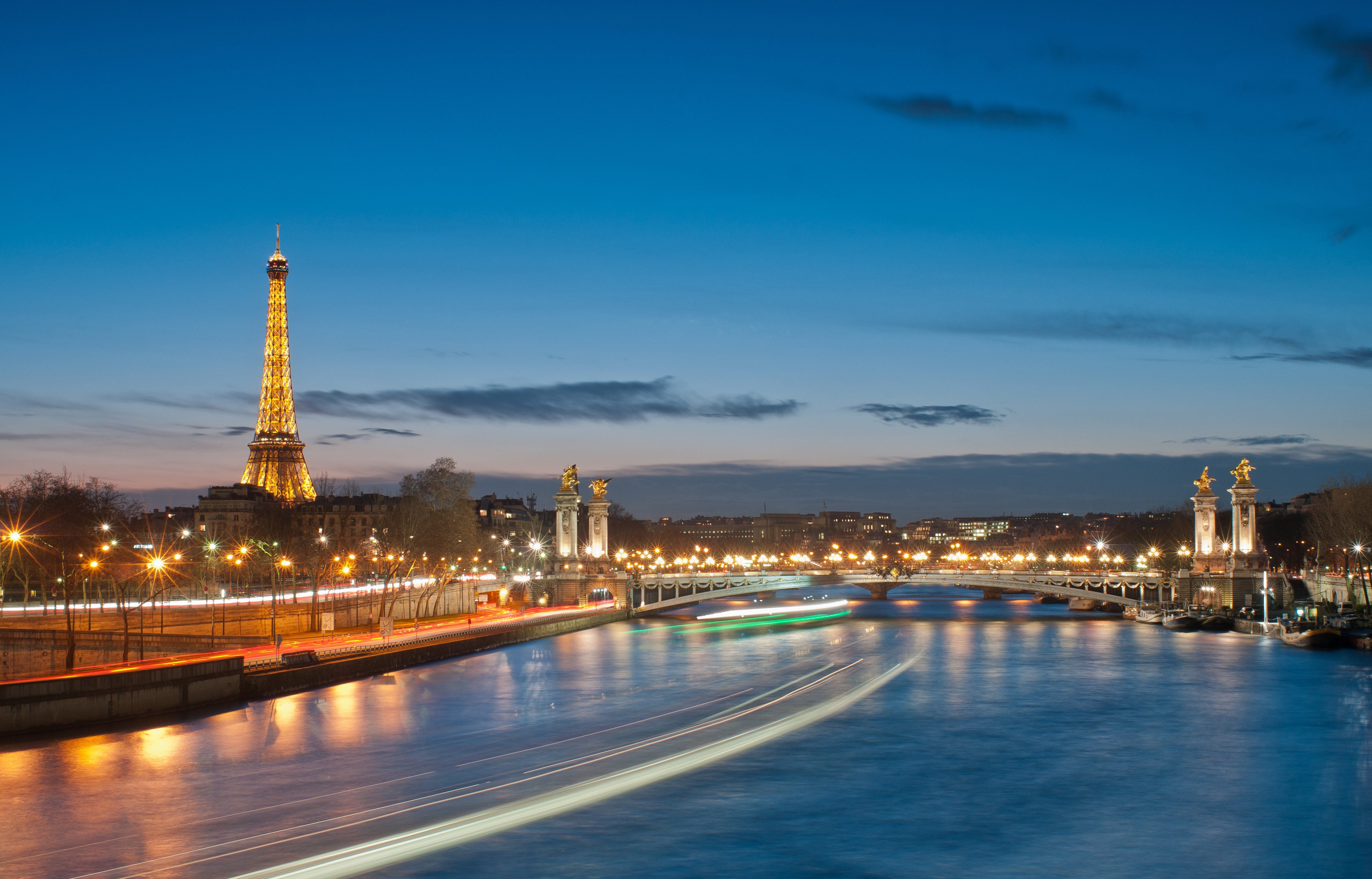 Eiffel Tower and Pont Alexandre III at dusk in Paris